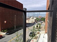 <b>Glass panel and aluminum balcony railing at The National in Baltimore City, MD</b>